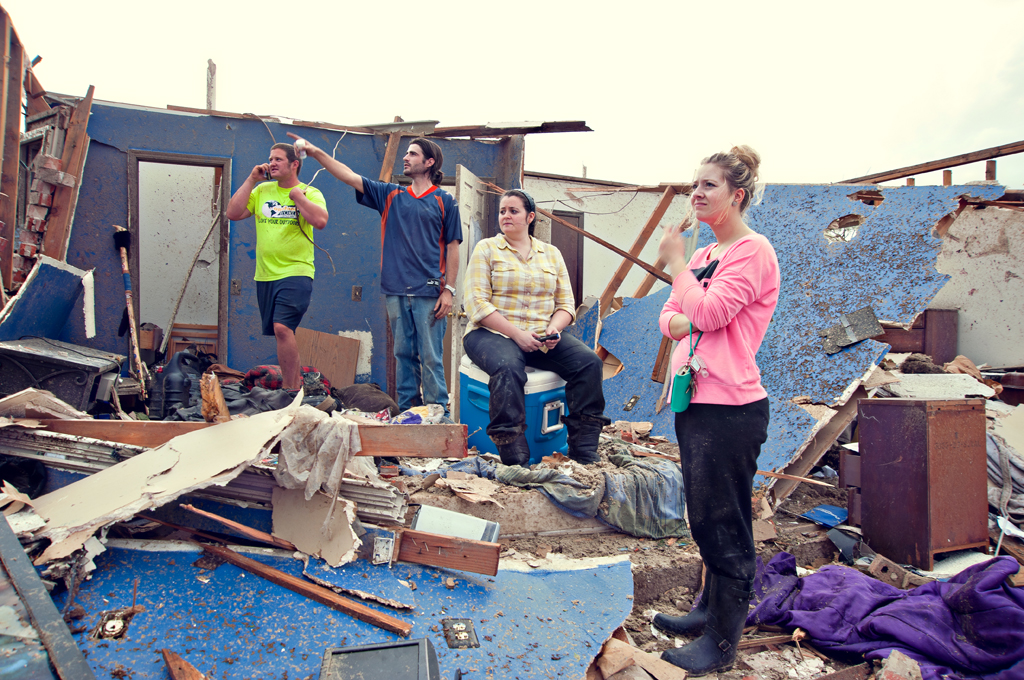 First responders and residents recover amid the aftermath of a deadly tornado in Moore, Okla.