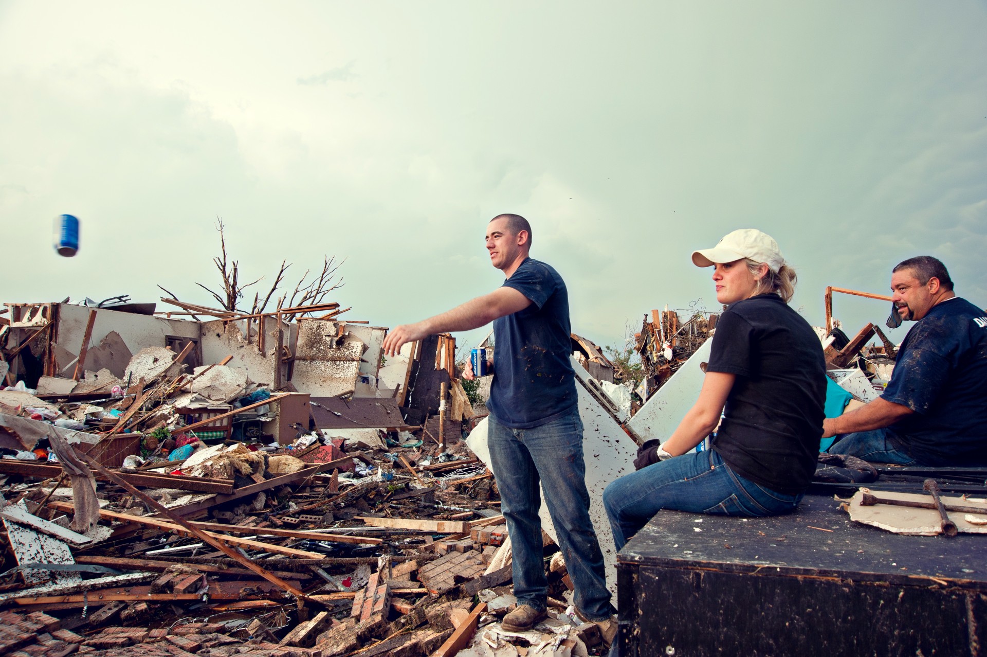 First responders and residents recover amid the aftermath of a deadly tornado in Moore, Okla.