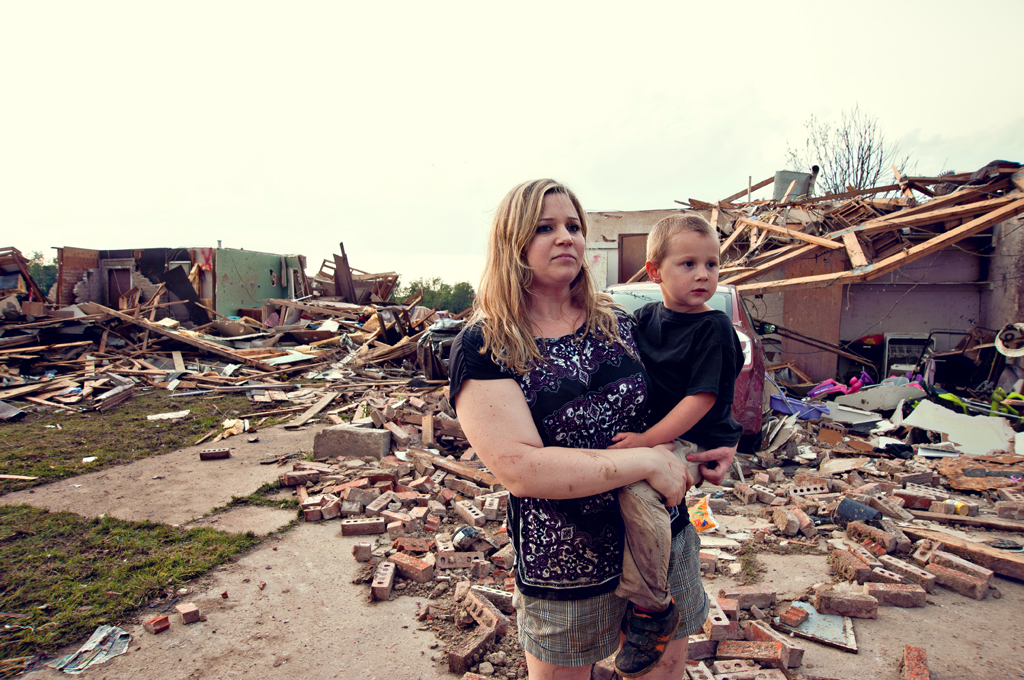 First responders and residents recover amid the aftermath of a deadly tornado in Moore, Okla.