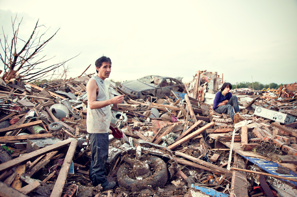 First responders and residents recover amid the aftermath of a deadly tornado in Moore, Okla.