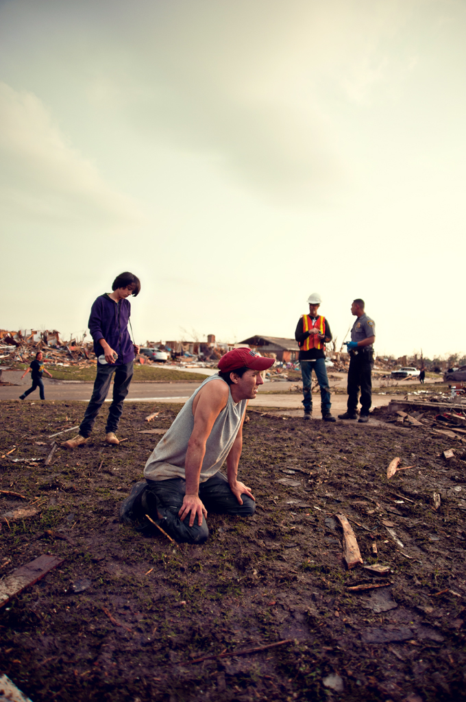First responders and residents recover amid the aftermath of a deadly tornado in Moore, Okla.